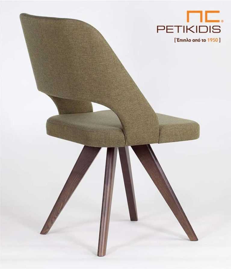 Καρέκλα Pollita με μασίφ ξύλινα πόδια. Η πλάτη και το κάθισμα είναι με ύφασμα για μεγαλύτερη άνεση σε πράσινους τόνους αλέκιαστο και αδιάβροχο. Λεπτομέρεια πλάτης.