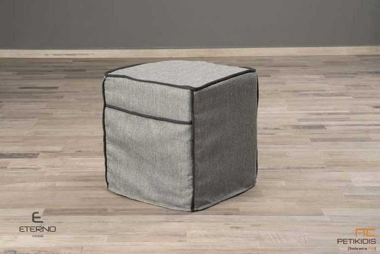 Σκαμπό New free. Ντυμένο εξ' ολοκλήρου με ύφασμα σε γκρι τόνους. Το σύνολο συμπληρώνουν οι μοντέρνες λεπτομέρειες από σκούρο γκρι ρέλι. Λεπτομέρεια.