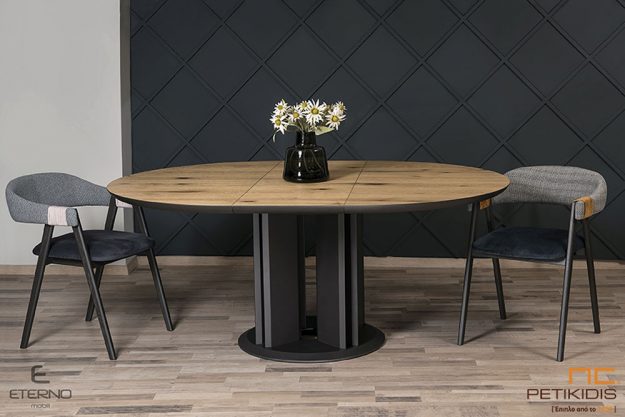 Τραπέζι ροτόντα Grace με συνδυασμό ξύλου δρυς ρουστίκ και πόδι από γκοφρέ λάκα. Ιδανικό για μικρούς χώρους δίνοντας μοντέρνα , ρουστίκ και industrial διάθεση. Δυνατότητα προέκτασης.