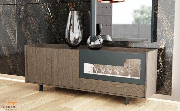 a cabinet with wine glasses and a mirror