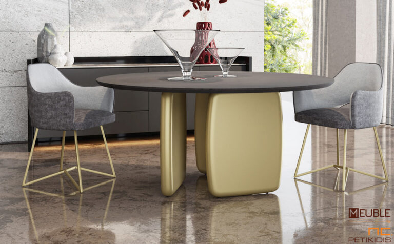 Τραπέζι ροτόντα Zuka σε μοντέρνο στυλ με βάση σε χρυσή λάκα ματ και καπάκι από ξύλο δρυς. Υπάρχει η δυνατότητα επιλογής χρωμάτων ανάμεσα από μία μεγάλη γκάμα.