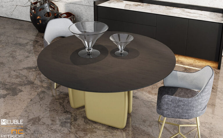 Τραπέζι ροτόντα Zuka σε μοντέρνο στυλ με βάση σε χρυσή λάκα ματ και καπάκι από ξύλο δρυς. Υπάρχει η δυνατότητα επιλογής χρωμάτων ανάμεσα από μία μεγάλη γκάμα. Λεπτομέρεια.