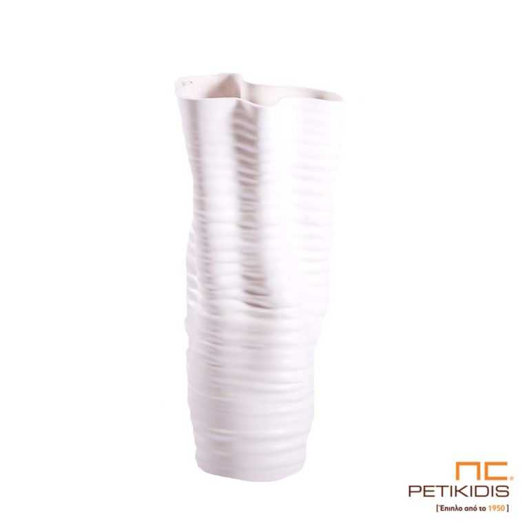 Επιτραπέζιο διακοσμητικό βάζο "Wave" από κεραμικό υλικό σε άσπρο χρώμα. Οι διαστάσεις του είναι 46cm ύψος,20cm πλάτος και 22cm φάρδος.