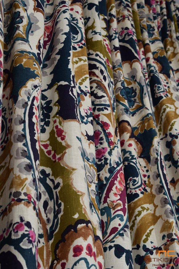 Κουρτίνες Κουρτίνα σε έντωνα χρώματα λαδί,μπλε,μοβ,εκρού με σχέδια από λαχούρι.