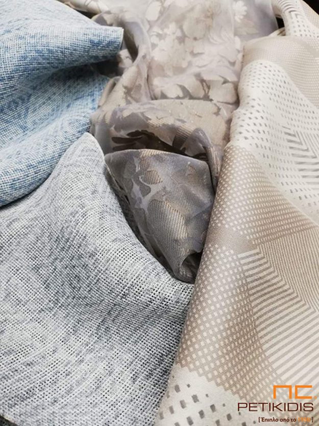 Κουρτίνες Κουρτίνες σε διαφορετικά σχέδια και υφάσματα σε γκρι,μπλε, καφέ αποχρώσεις.