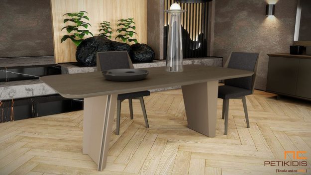 Τραπεζαρία Stretto με δυνατότητα προέκτασης από ξύλο δρυς και λεπτομέρειες λάκας. Διαθέτει δύο κεντρικά πόδια και έχει μοντέρνα minimal γραμμή. Λεπτομέρεια.