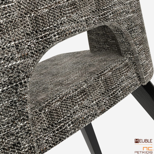 Η καρέκλα Marien up είναι κατασκευασμένη από μασίφ ξύλο σε πολλές αποχρώσεις. Το ύφασμά της είναι σε γκρι χρώμα αδιάβροχο και αλέκιαστο και διατίθεται σε μεγάλη ποικιλία χρωμάτων και υφών. Μοντέρνο και Minimal style. Λεπτομέρεια υφάσματος.