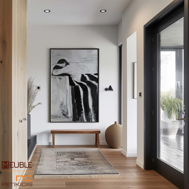 Πίνακες σε Καμβά ή Poster Ο πίνακας “Sleeping on the Sofa” απεικονίζει μια γυναίκα καθισμένη σε έναν καναπέ, καλυμμένη με μία κουβέρτα με ρίγες, σε στάση βαθιάς χαλάρωσης και ύπνου. Το έργο χαρακτηρίζεται από το ασπρόμαυρα χρώμα και απαλά γραμμικά στοιχεία, δημιουργώντας μία ατμόσφαιρα ηρεμίας και χαλάρωσης σε ένα ζεστό και οικείο περιβάλλον. Οι ζωντανές πινελιές και η αντίθεση στο ασπρόμαυρο αναδεικνύουν την αισθητική της τέχνης.Παράγεται και σε poster. Διαθέσιμες διαστάσεις 50X70, 70X100, 80X120, 100X140, 120X160, 120X180.